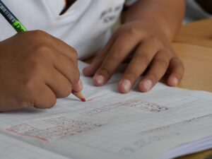 child doing math homework